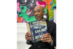 Montell Williams with book